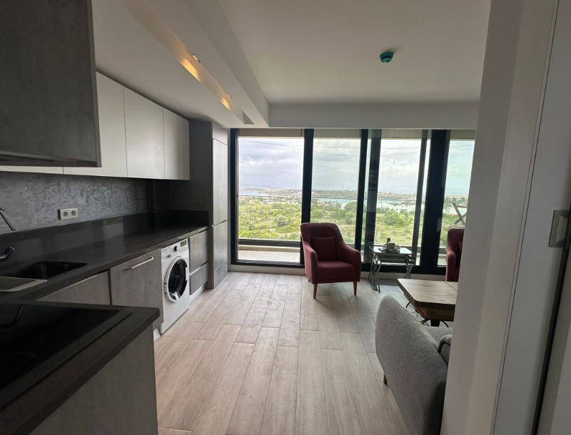 ÇEŞME AYASARANDA'DA SATILIK DENİZ MANZARALI 1+1 REZIDANS DAİRE.