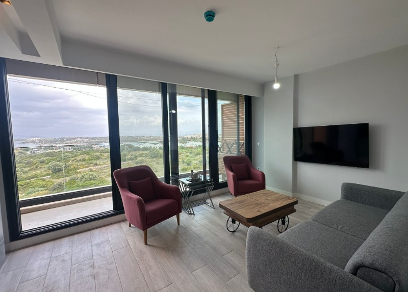 ÇEŞME AYASARANDA'DA SATILIK DENİZ MANZARALI 1+1 REZIDANS DAİRE.
