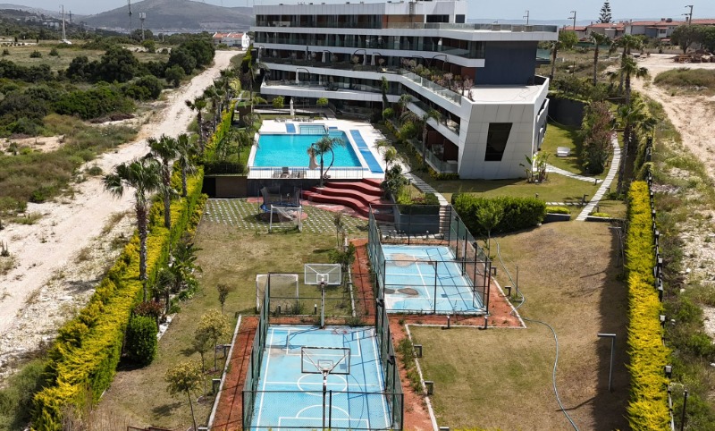 ÇEŞME AYASARANDA'DA SATILIK DENİZ MANZARALI 1+1 REZIDANS DAİRE.