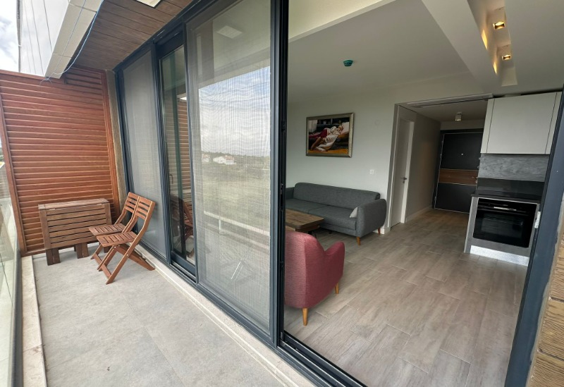 ÇEŞME AYASARANDA'DA SATILIK DENİZ MANZARALI 1+1 REZIDANS DAİRE.