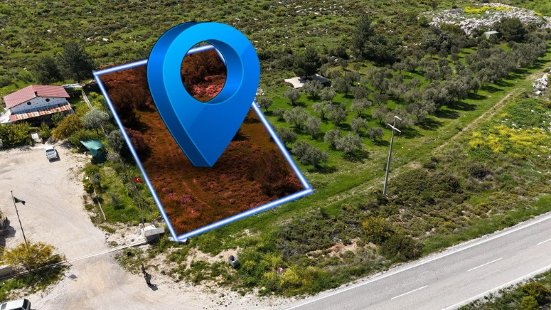 ÇEŞME GERMİYAN'DA YOL CEPHELİ SATILIK 1.990 M² TARLA.