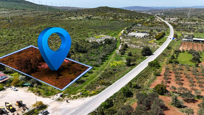 ÇEŞME GERMİYAN'DA YOL CEPHELİ SATILIK 1.990 M² TARLA.